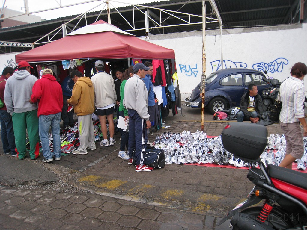 2011 Queretaro MX Half Marathon 190.JPG - The 2011 Queretaro Marathon on October 9. I was in town and was able to run the 21K, or 13.1 mile half marathon. Shoes for sale outside the official area, one of several selling shoes.